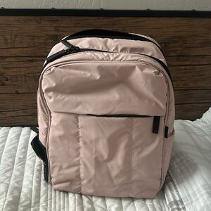 Rose color cloak backpack with multiple pockets